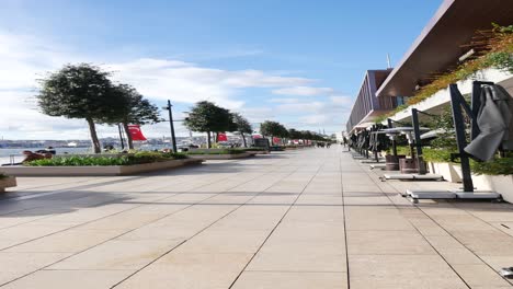 people walking along a waterfront promenade in istanbul, turkey