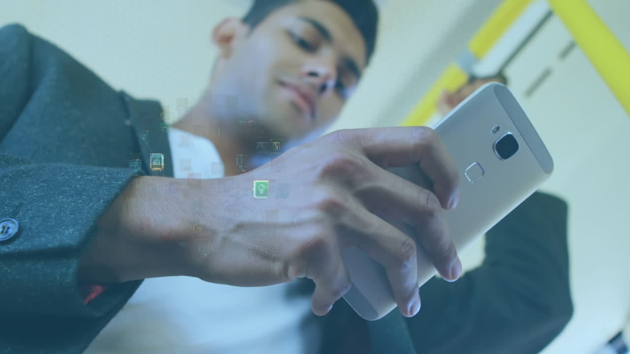 Animation of data processing over biracial businessman using smartphone