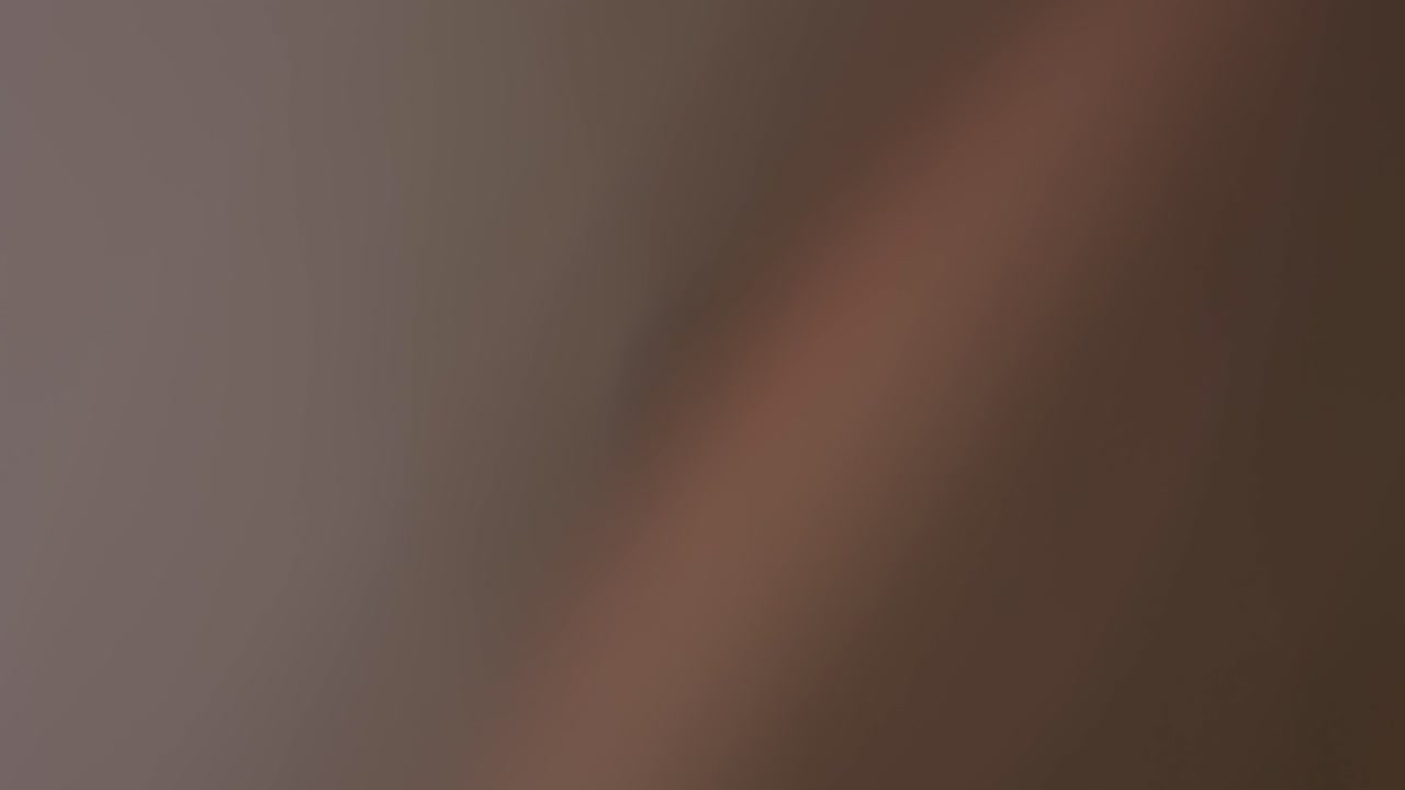 Soft Golden Lens Flare with Bokeh Orbs