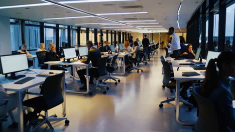 busy office workers in modern workspace