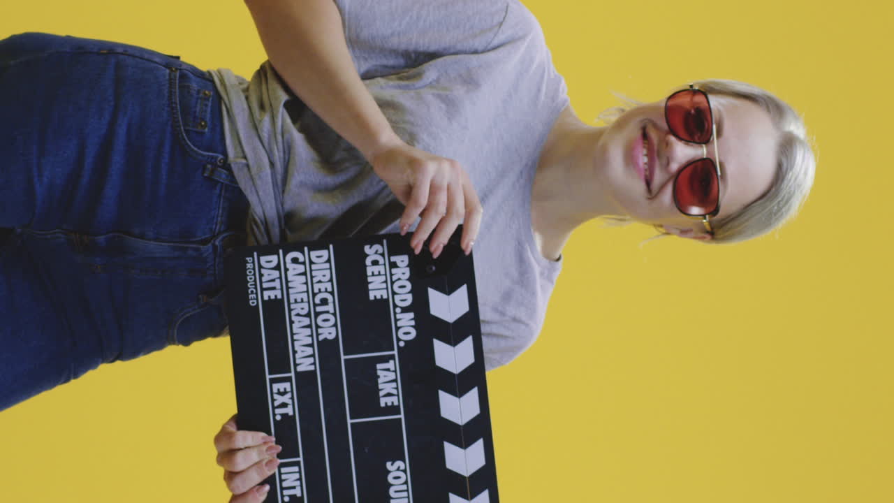 cheerful Woman Framed by Donut Inflatable at the Beach a Fun Summer Moment as a Woman in a Straw Hat Playfully Poses through a Pink Donutshaped Inflatable by the Sea a Vibrant and Joyful Tropical Vacation Scene