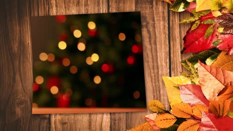 Animation-of-christmas-fairy-lights-flickering-on-wooden-background