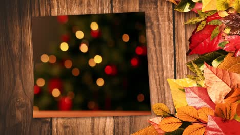 animation of christmas fairy lights flickering on wooden background