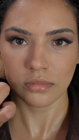 a skilled makeup artist expertly showcases various skin techniques to achieve a radiant and flawless appearance
