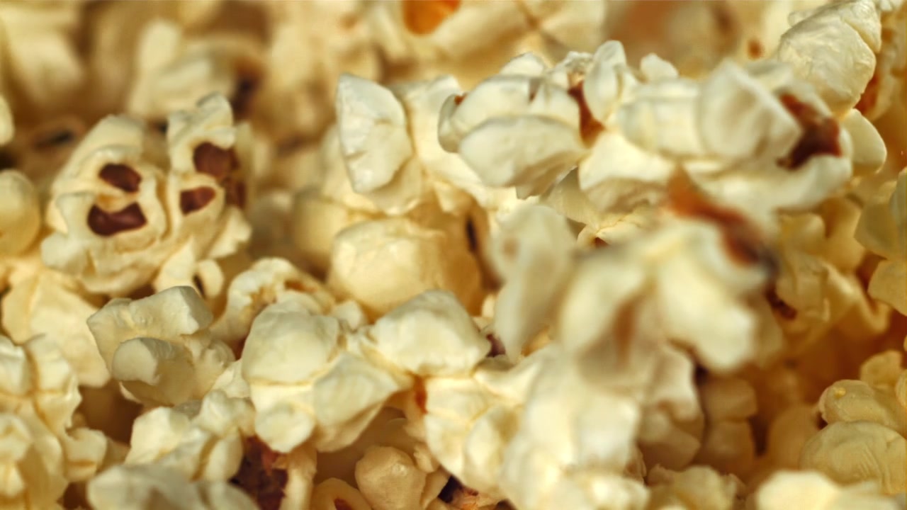 Close Up of Fresh Popcorn Falling in Slow Motion