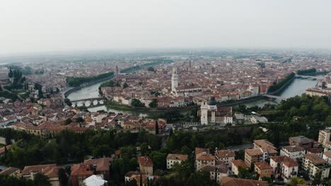 drone shot pulling away from verona, italy