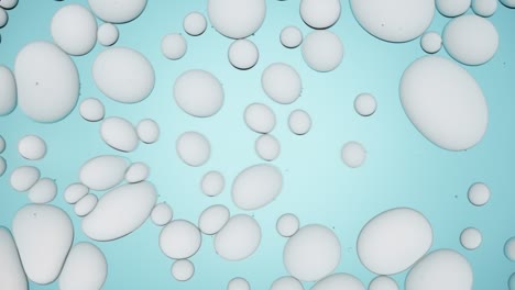 light grey different sized bubbles move in circles