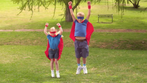 children pretending to be superhero