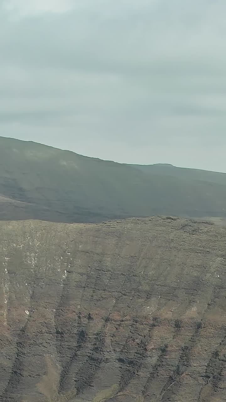Winding Serpent Road in Arid Mountains
