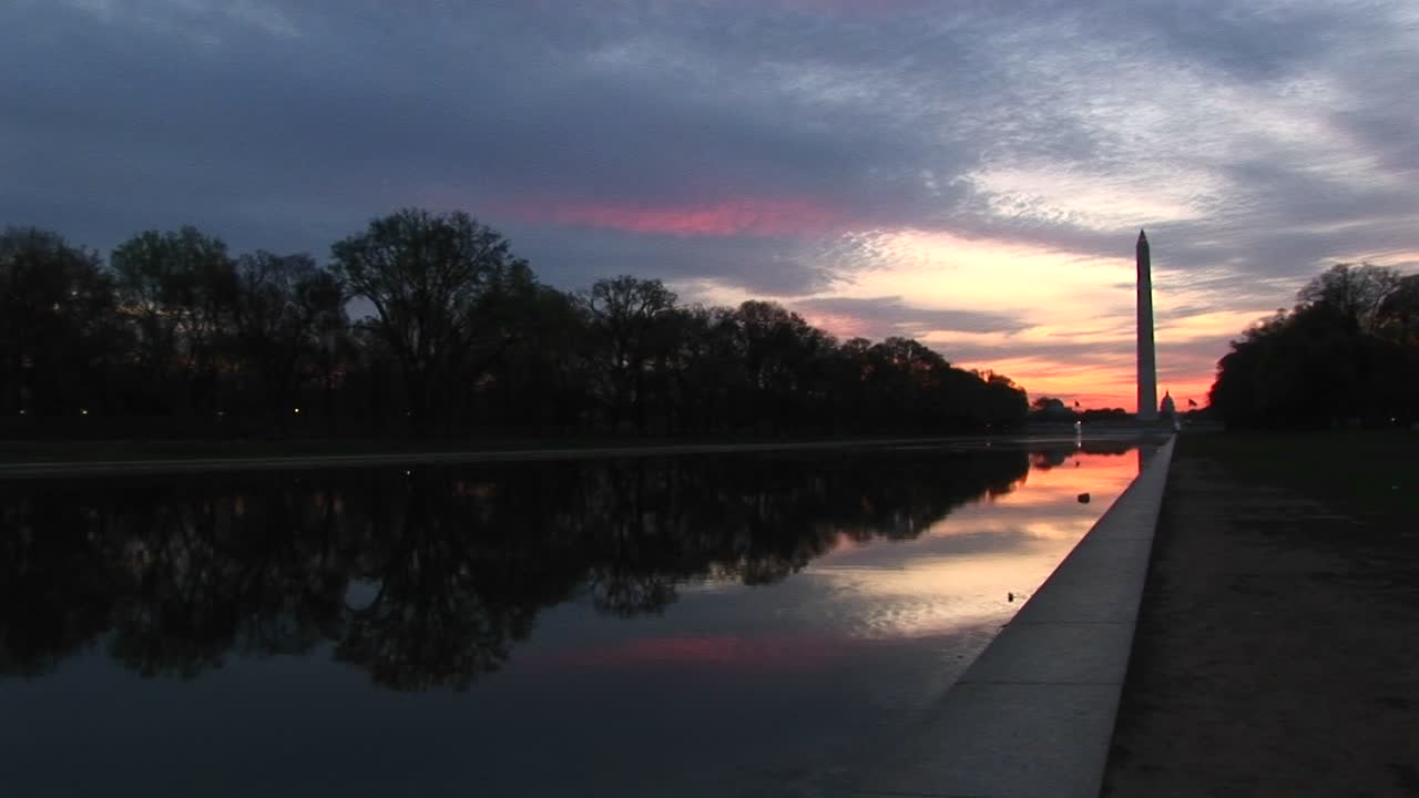 Washington Dc'S Reflecting Pool At Base Of The Washington Monument Lives Up To Its Name During This Goldenhour Footage