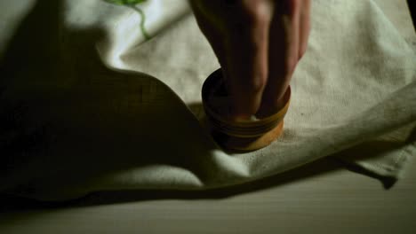 male hand take salt from salt bowl. seasoning food. adding salt to food