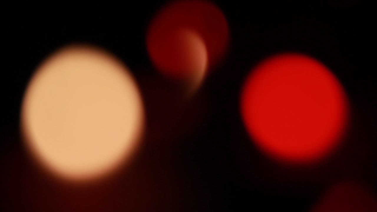 Red and Orange Bokeh Lights on Dark Background