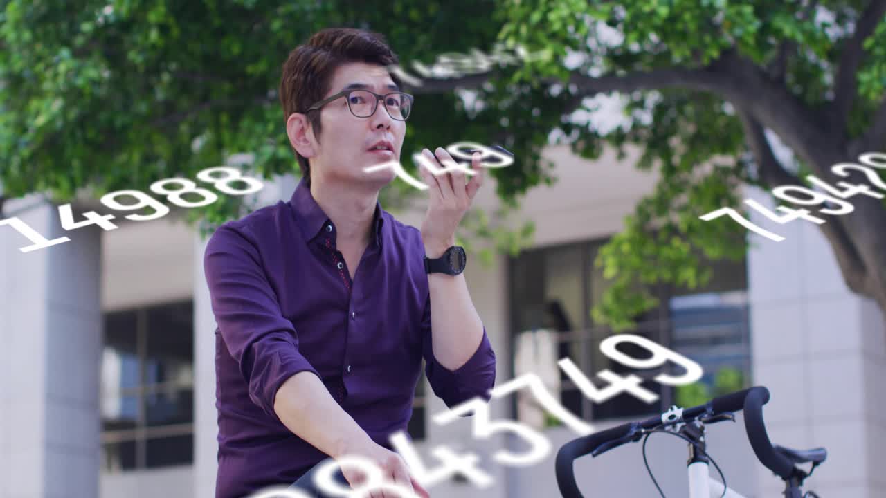 Office man sitting on bicycle speaking into device, activating floating numbers around him for data