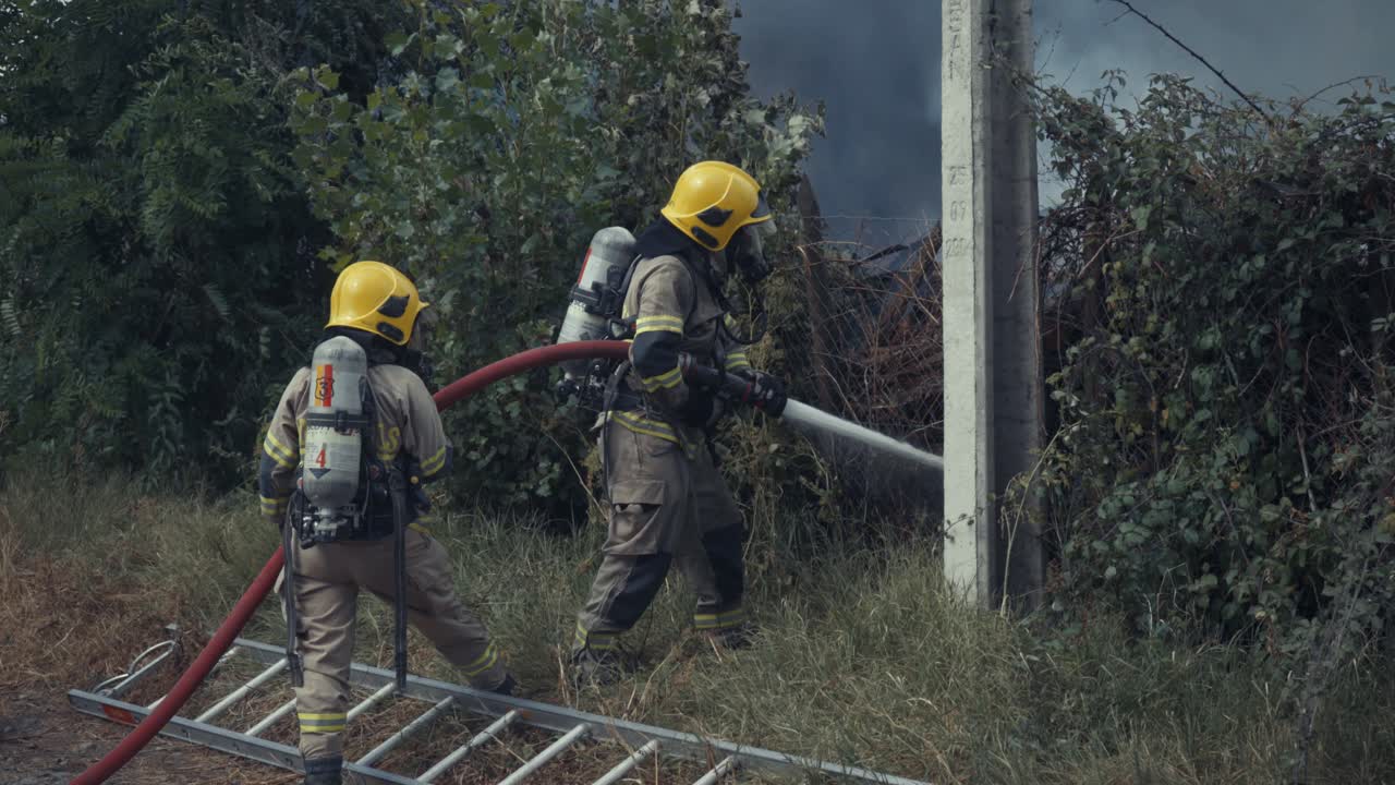firefighters in action on a farm in flames in Chile
