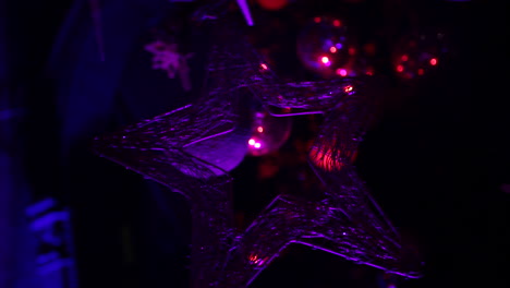 Christmas-tree-balls-with-purple-lights---close-up