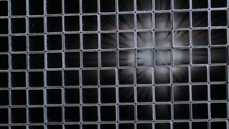 abstract background of steel square pipes stacked on a pallet