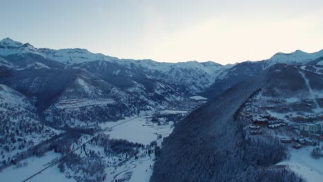 Drone-aerial-view-of-downtown-Telluride-during-sunset-from-a-distance