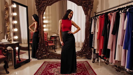 woman trying on dresses in a luxury dressing room