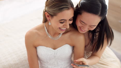 happy bridesmaids and bride in a bedroom