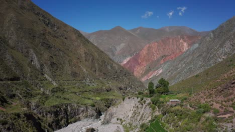 rising aerial of green mountains at scenic iruya in sunny argentina