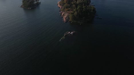 aerial footage of small rocky islands in the finnish archipelago