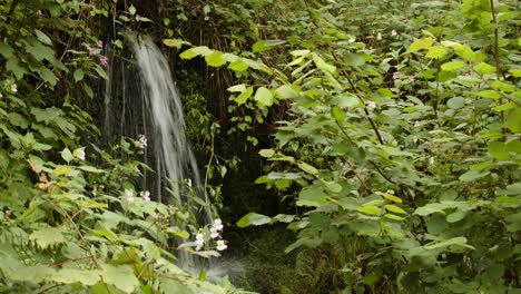 wide-Shot-of-a-small-waher-fall-at-Garw-Valley,-Afan,-Cynonville