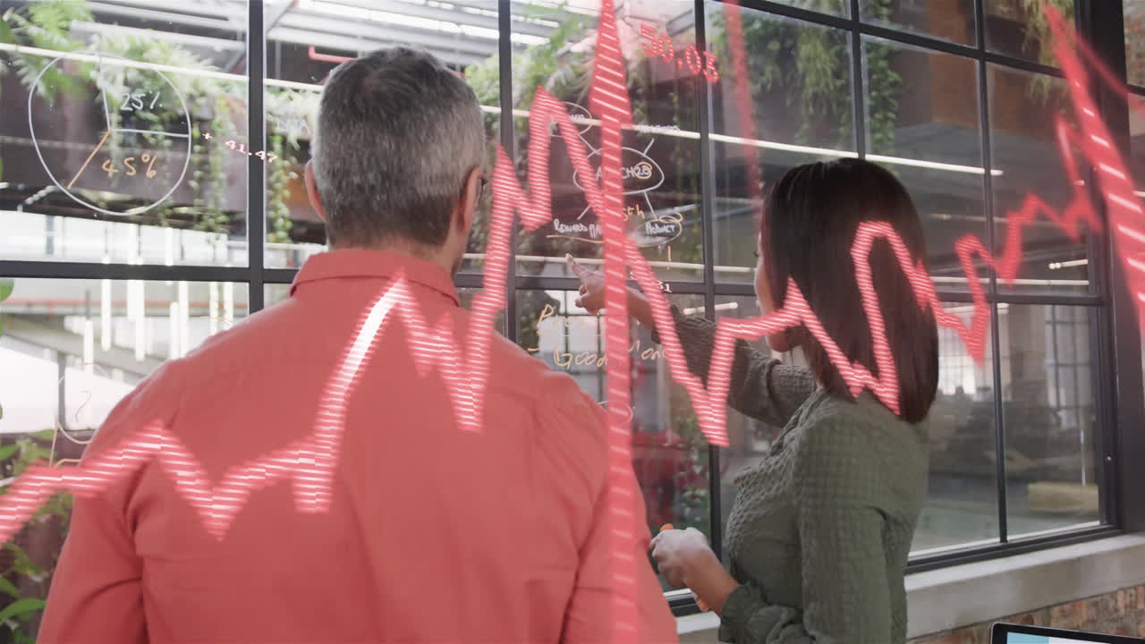 Animation of data processing and diagrams over diverse business people discussing work in office