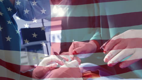 animation of flag of united states of america waving over surgeons in operating theatre