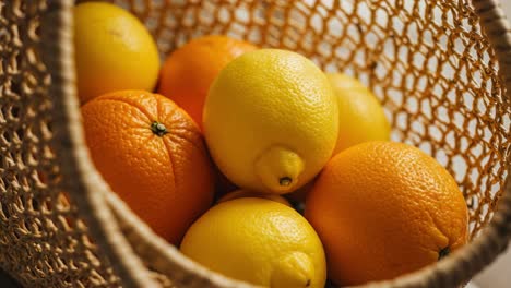 a vibrant collection of fresh oranges and lemons arranged harmoniously in a woven basket highlighting their bright colors and natural textures