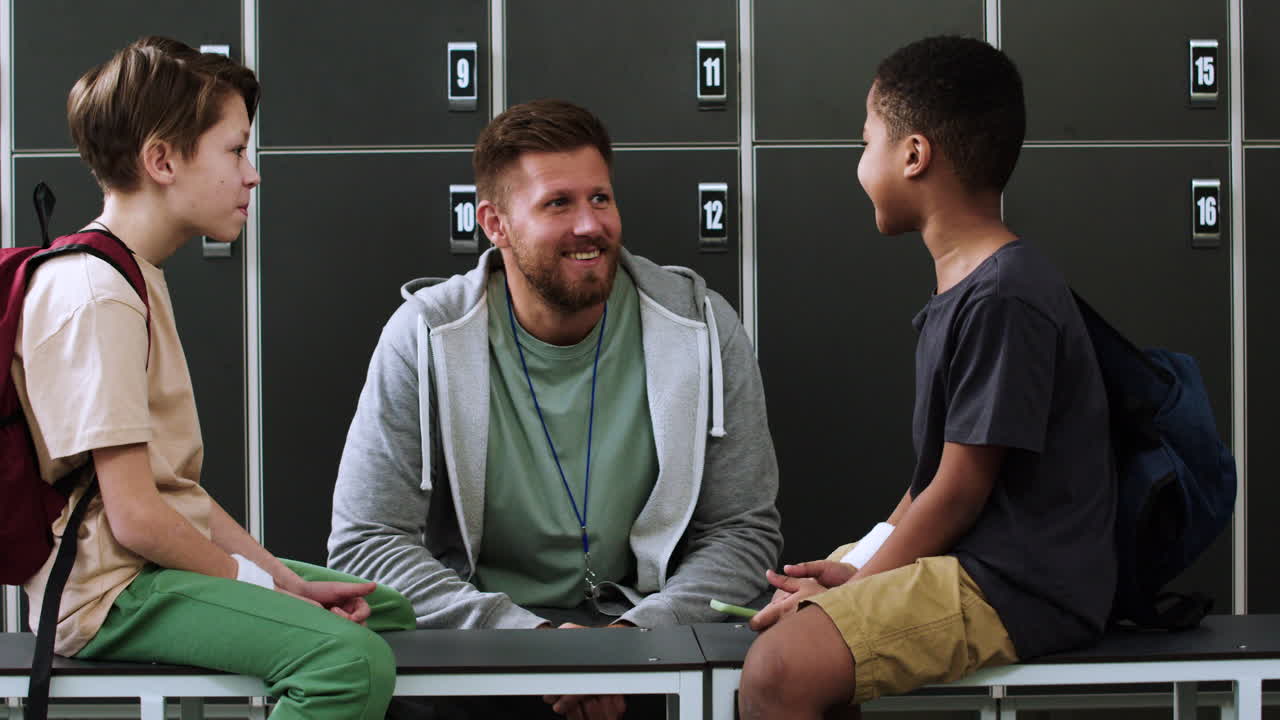 Man and children at the locker room