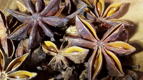 christmas bakery, herbs, star anise on a wooden background