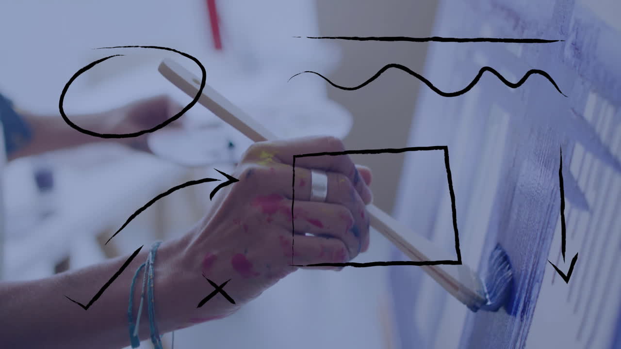 Hands painting on canvas with abstract black shapes overlay animation