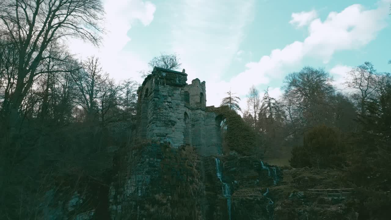 Aerial Delight: Captivating Drone Footage of Waterfall and Ancient Ruin in Berpark Wilhelmshöhe, Kassel
