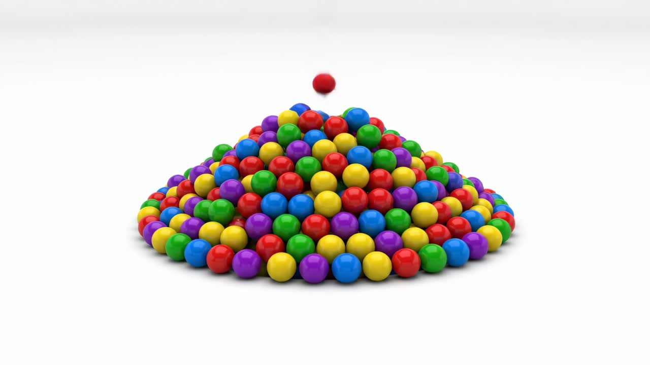 Colorful balls falling into a hole