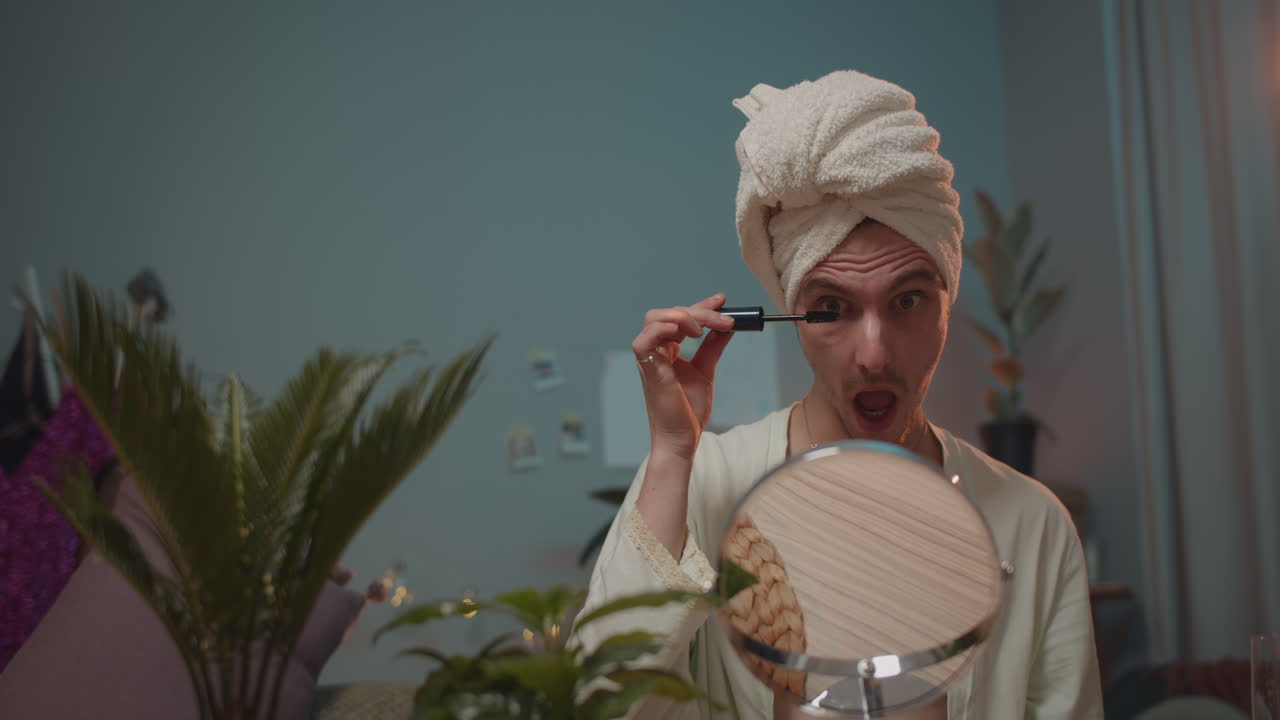 Man Applying Mascara at Home