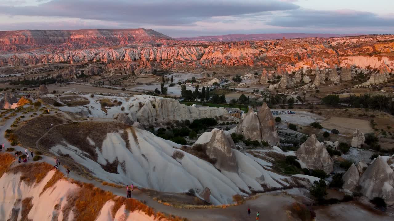 Turkish sunset Cappadocia unique rock formations, aerial view