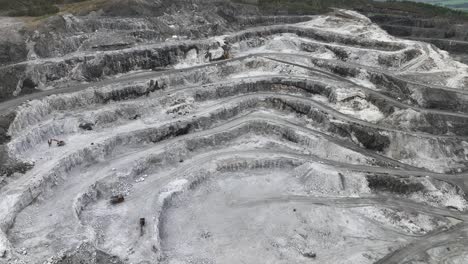 Close-view-of-carved-out-mountain-pattern-at-mining-site-between-Molde-and-Kristiansund-Norway---Damagaed-mountain-and-nature-due-to-human-activities