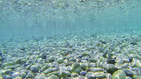 underwater texture loop with stones