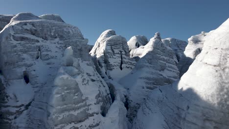 drone shot through the rocks and ice of the folgefonna glacier, buerbreen area