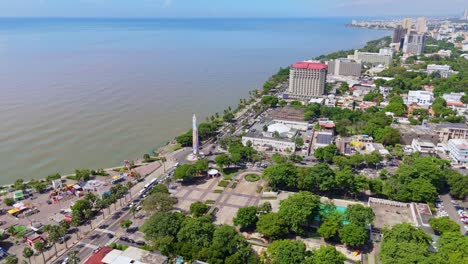 distant drone shot of seafront george washington avenue in dominican republic