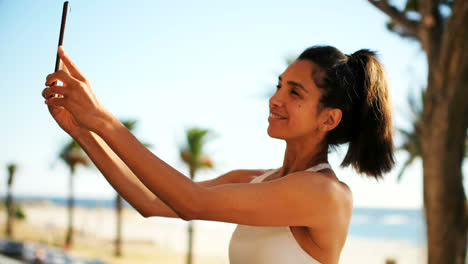 Woman-taking-selfie-in-balcony-4k