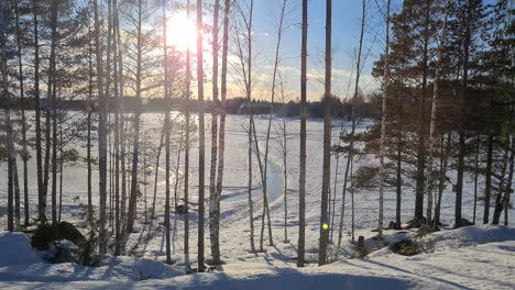 Iced-Kiruna-lake,-Northern-Sweden.-Tilt-up