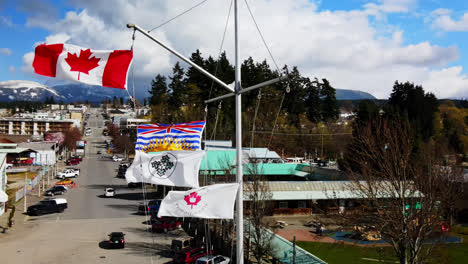 Closeup-Of-Flags-Waving-In-The-Wind-In-Port-Alberni-On-Vancouver-Island,-British-Columbia,-Canada