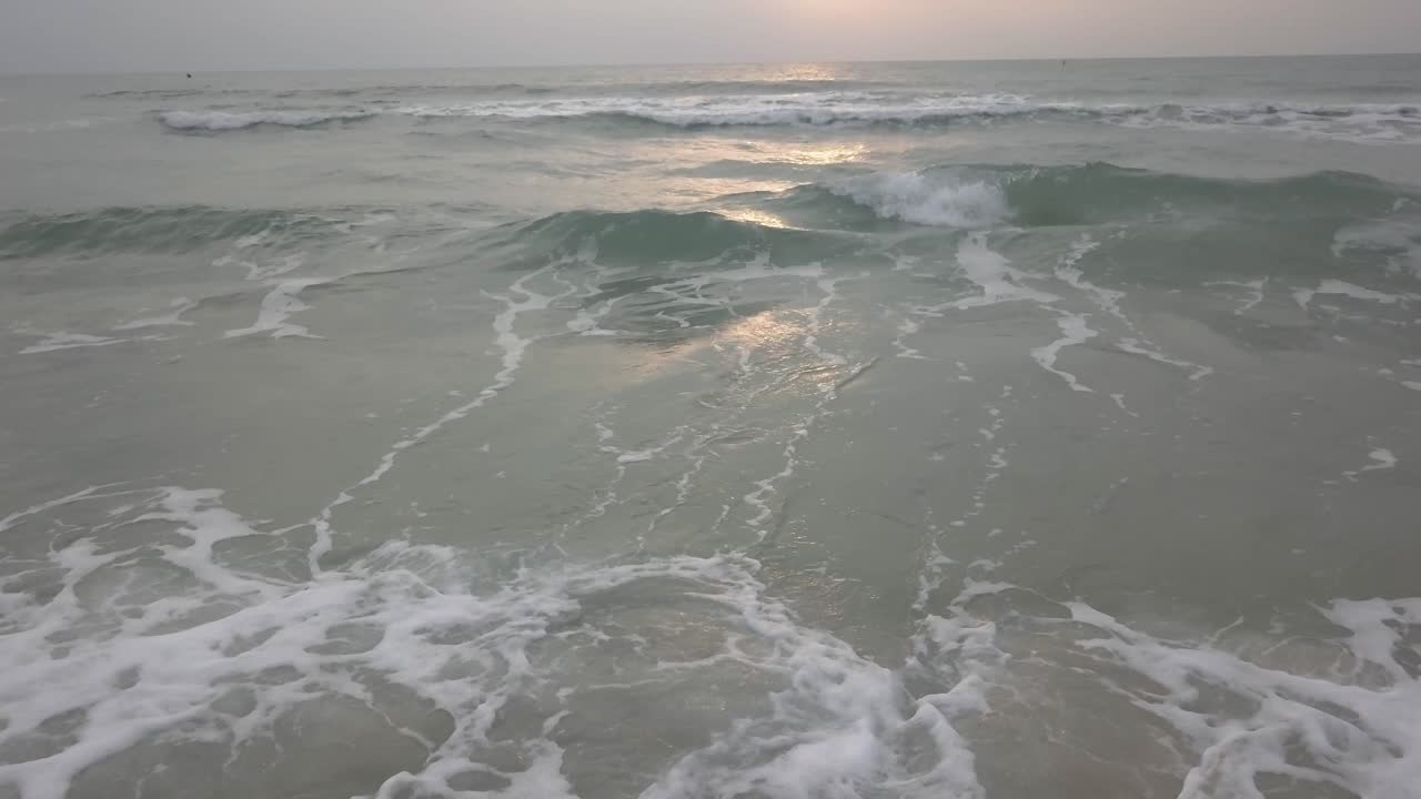 Gentle Morning Waves on the Beach