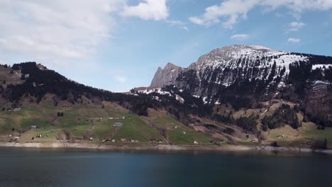 Breathtaking-View-of-a-Scenic-Lake-in-the-Swiss-Alps,-Aerial-Drone-Shot