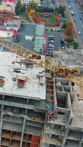 drone shot of busy construction site. aerial drone view of construction project in city