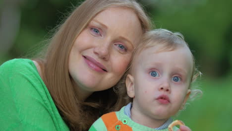 loving mother kissing the child