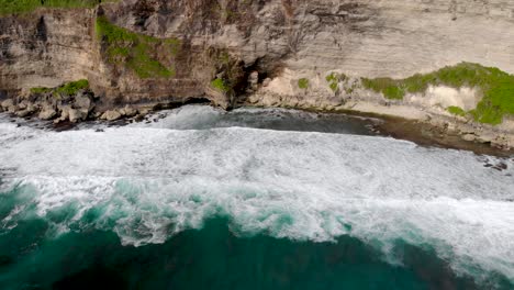 aerial  over the uluwatu cliffs in bali, indonesia