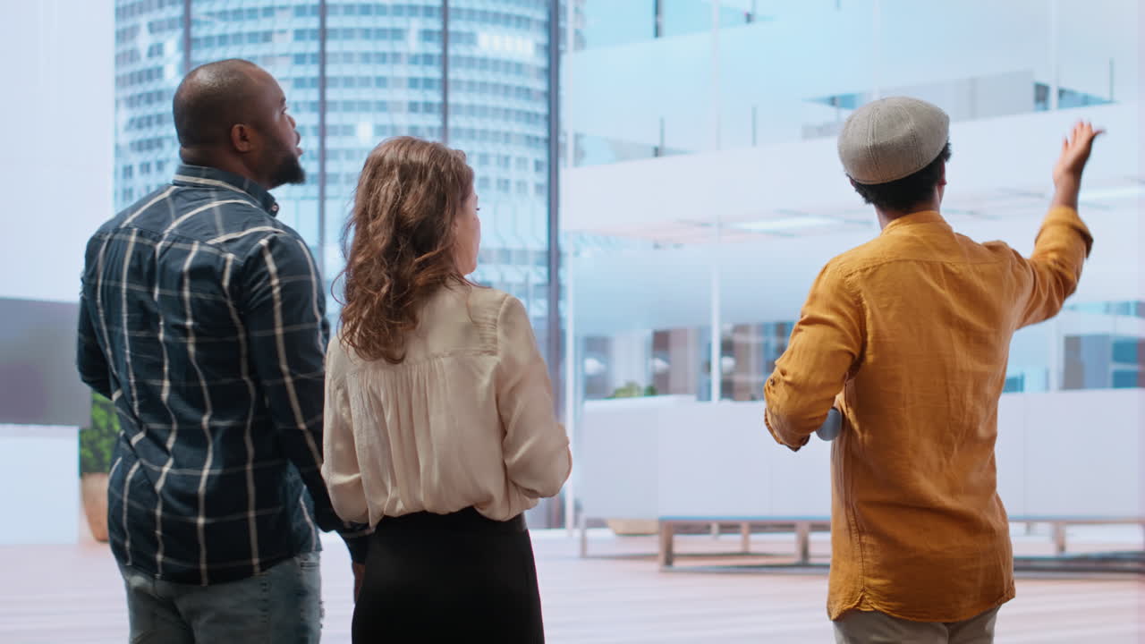 Corporate clients and a real estate agent negotiating a leasing contract