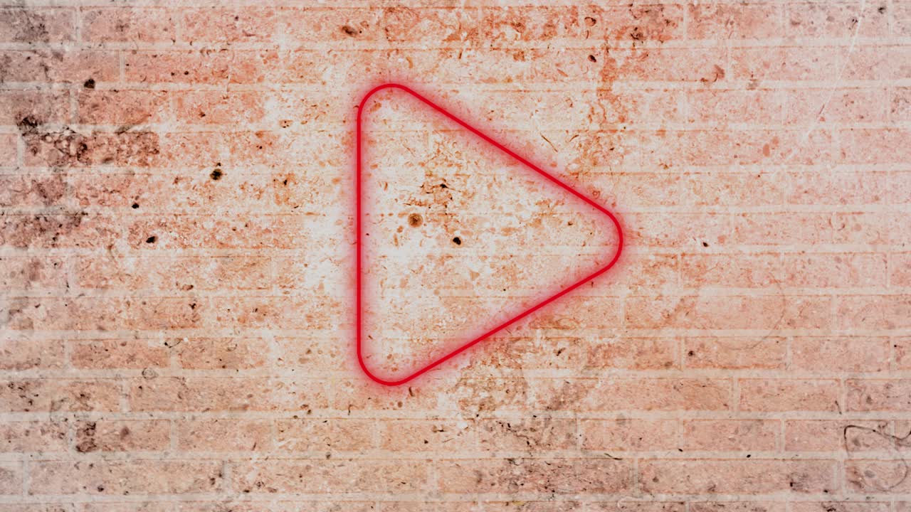 animación de un icono de juego de neón parpadeante en la pared de ladrillo